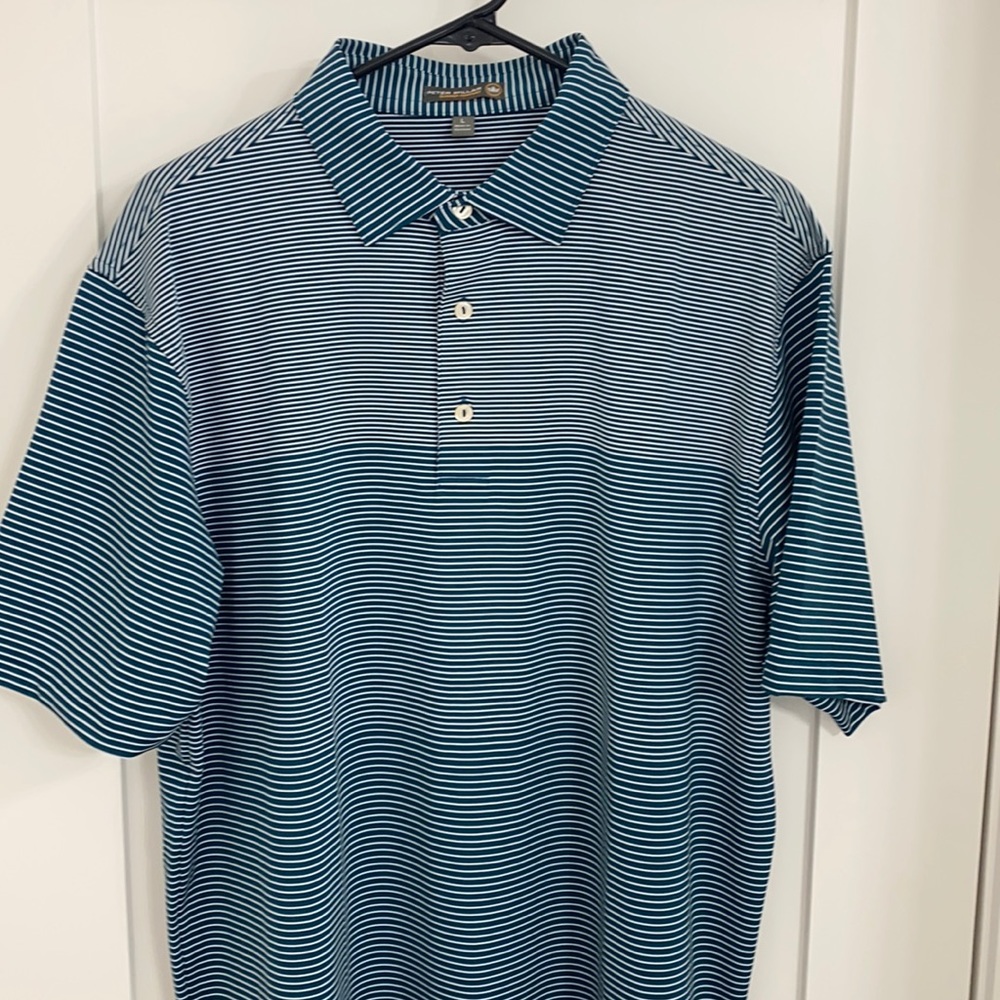 Navy and white striped Peter Millar golf shirt